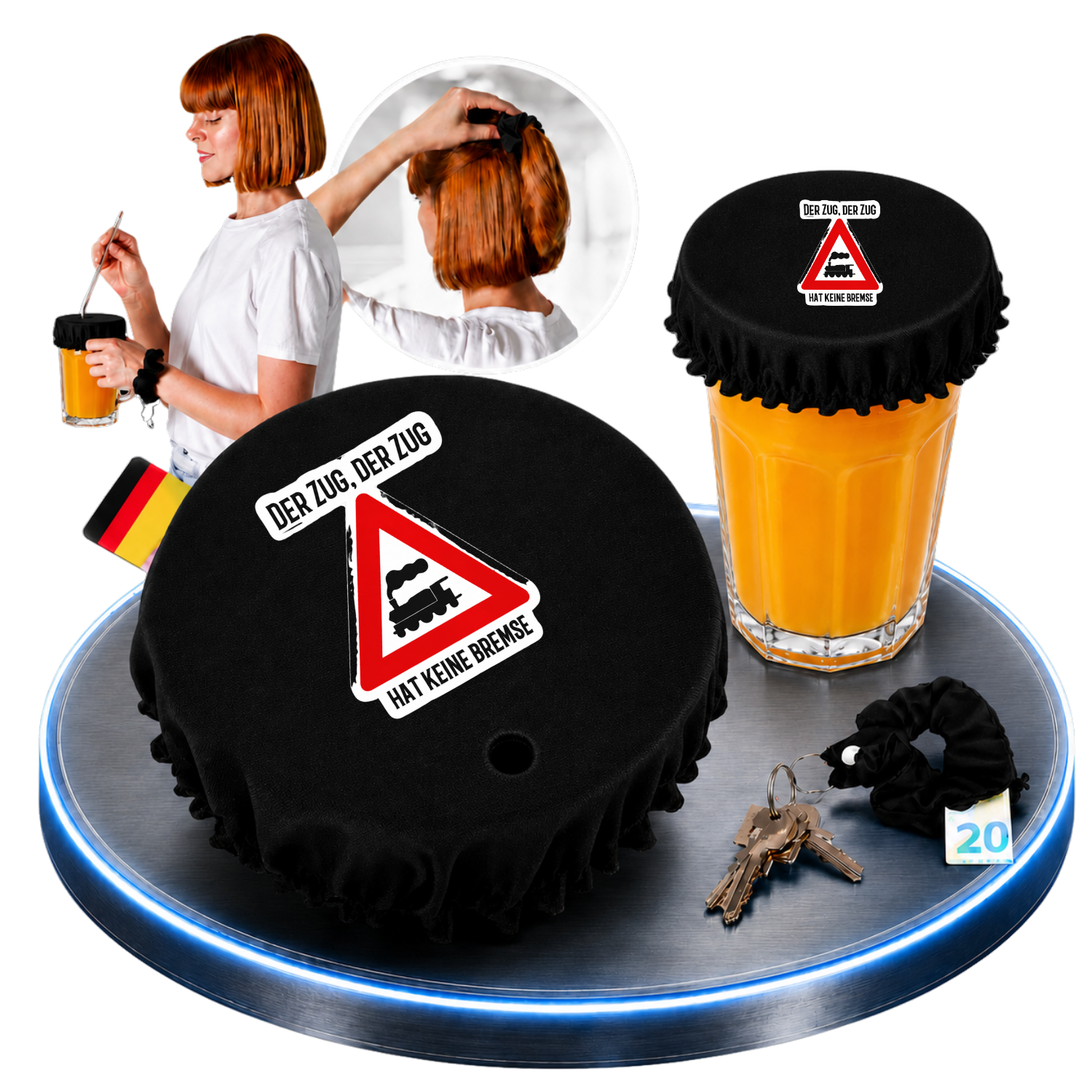 Schwarzer KO STOP Stoff-Getränkeschutz mit dem Motiv „Der Zug, der Zug hat keine Bremse“ auf einem Getränk. Wiederverwendbarer Drink Cover mit integriertem Haarband, Schlüsselanhänger und Geheimfach für Festivals, Partys, Karneval, Junggesellenabschiede und Events.