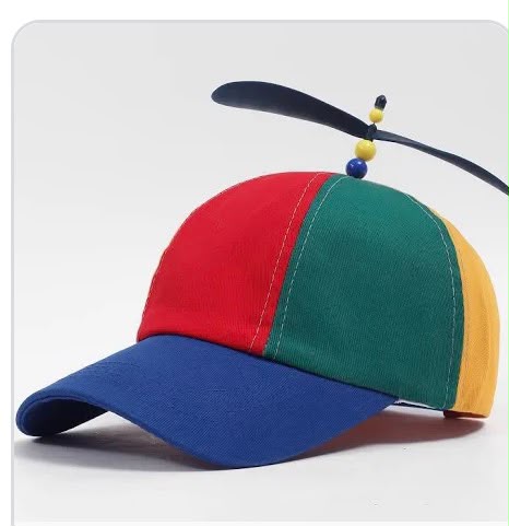 Bunte Haxxe Propeller-Cap mit blauem Schirm und schwarzem Propeller – ohne Unterschrift